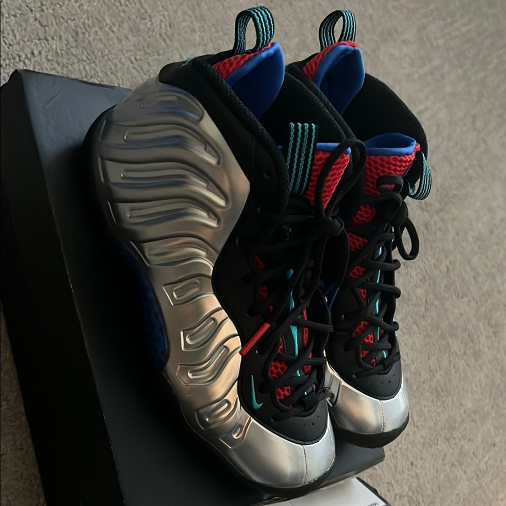 Silver and Black Foamposite Sneakers